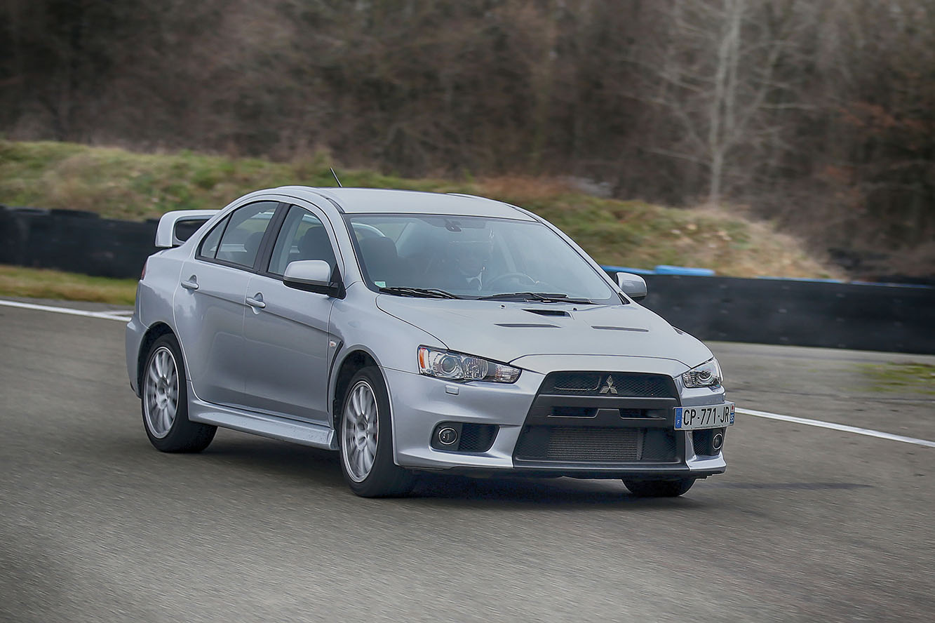 Мицубиси 11. Мицубиси Лансер 11. Ланцер Эво 11. Mitsubishi Lancer EVO 12. Mitsubishi EVO 11.